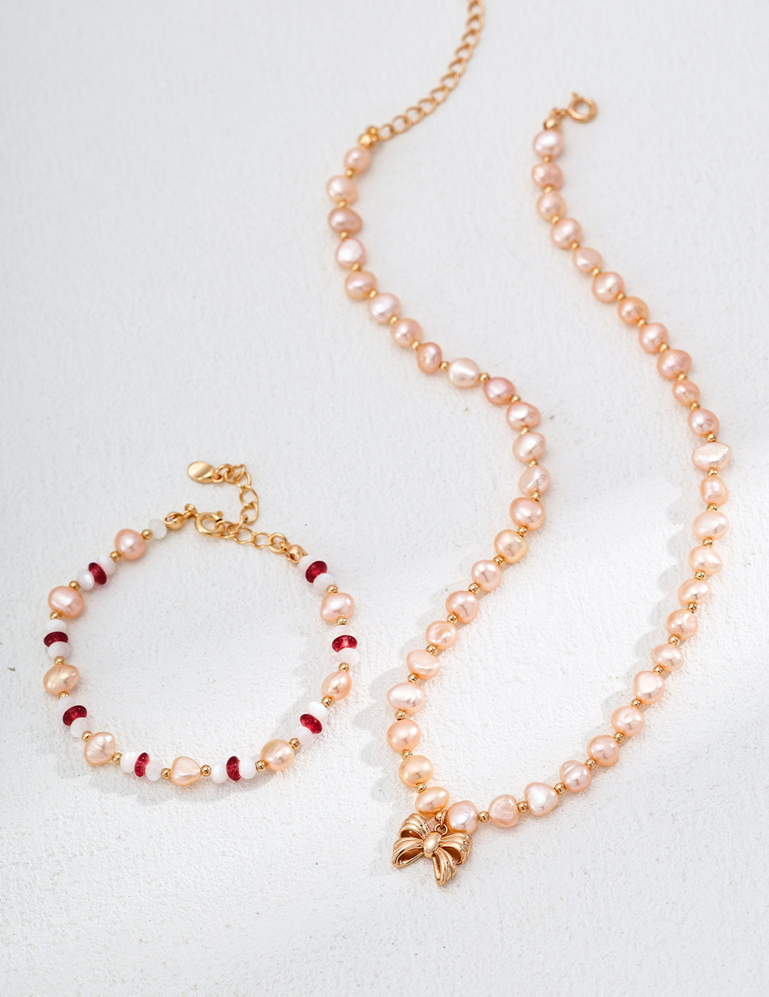 Vintage Gold-Tone Natural Pink Pearl Necklace with Bow Charm