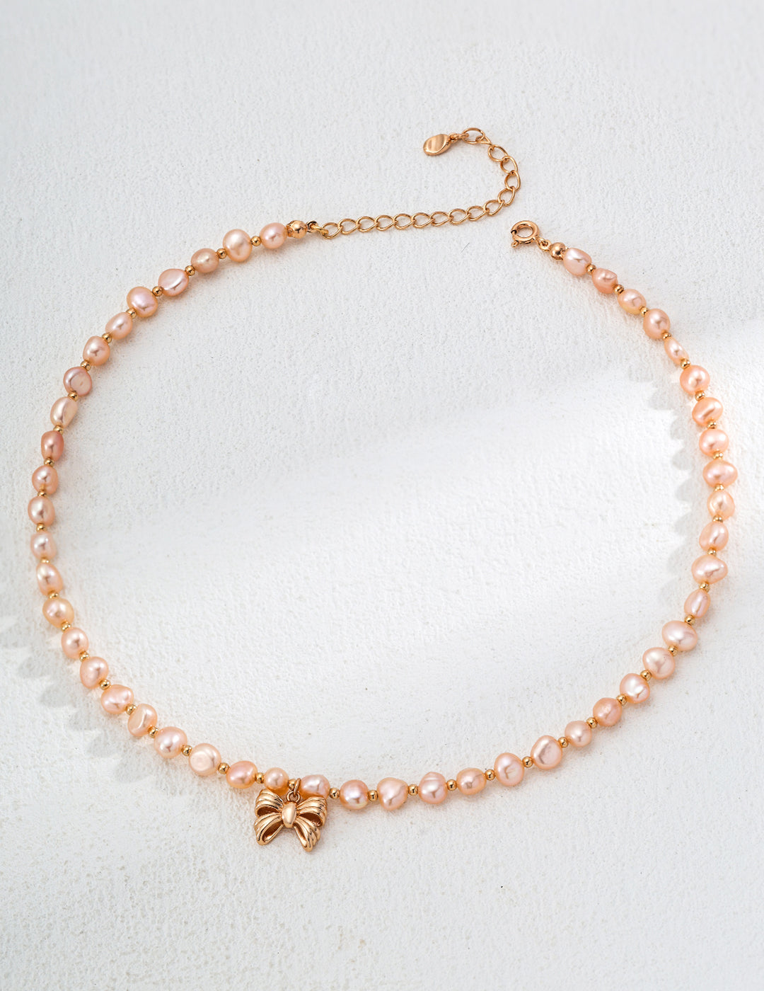 Vintage Gold-Tone Natural Pink Pearl Necklace with Bow Charm